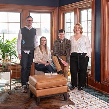 Students posing in a room they designed for the showhouse